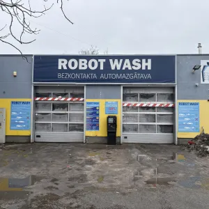Pelēka un dzeltena automazgātava ar uzrakstu "Robot Wash".