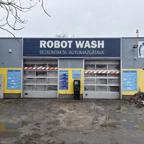 Pelēka un dzeltena automazgātava ar uzrakstu "Robot Wash".