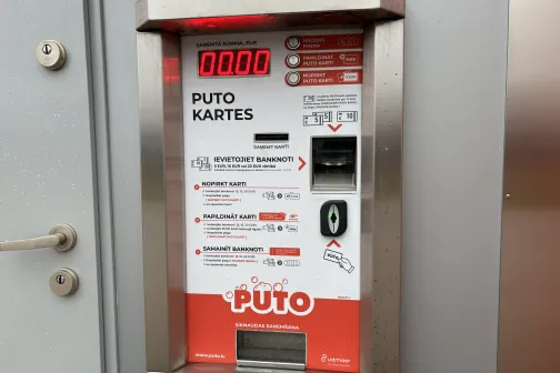 Automazgātavas naudas maiņas un klientu kartes aparāts.