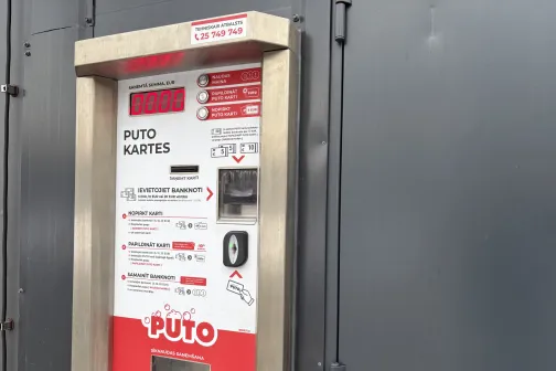 Automazgātuves maksājumu terminālis ar instrukcijām.